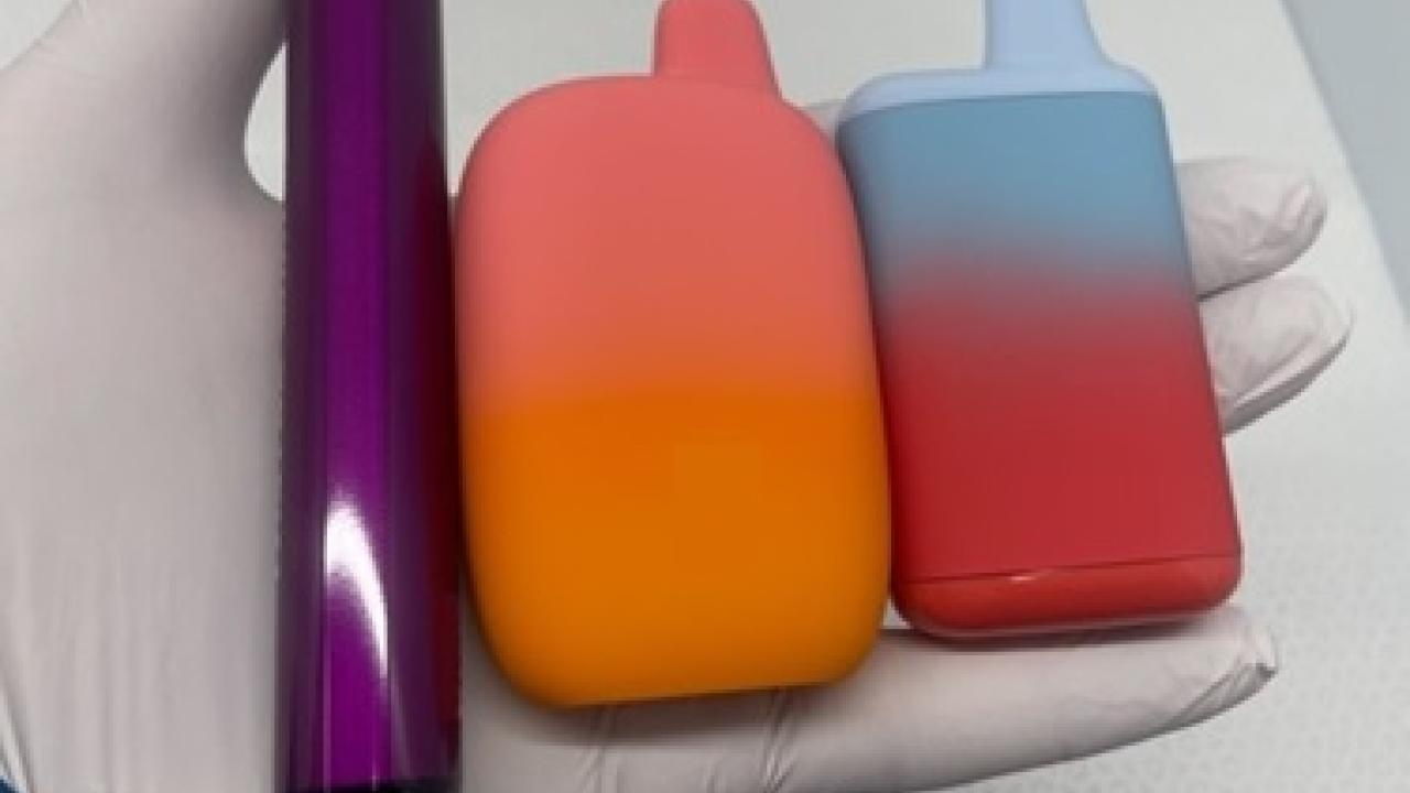 Photo of three disposable electronic cigarettes