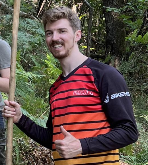 student standing doing field work